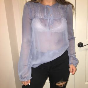 Sheer long sleeve top that creates a sexy outfit